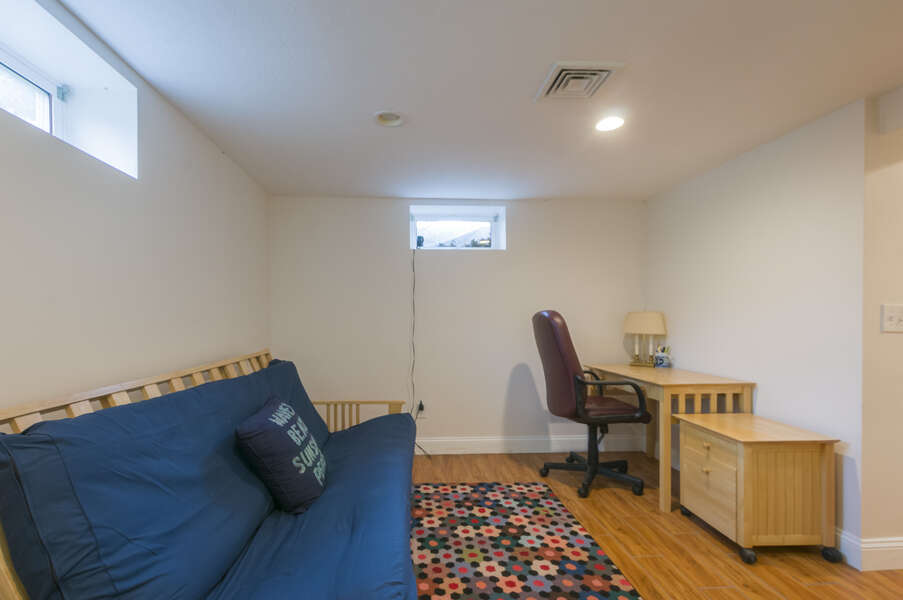 Futon and remote work area - Lower level.