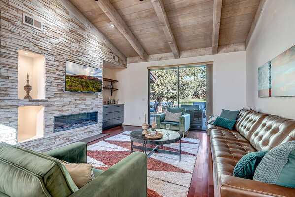 Beautiful Stone Wall and High Wood Beam Ceiling