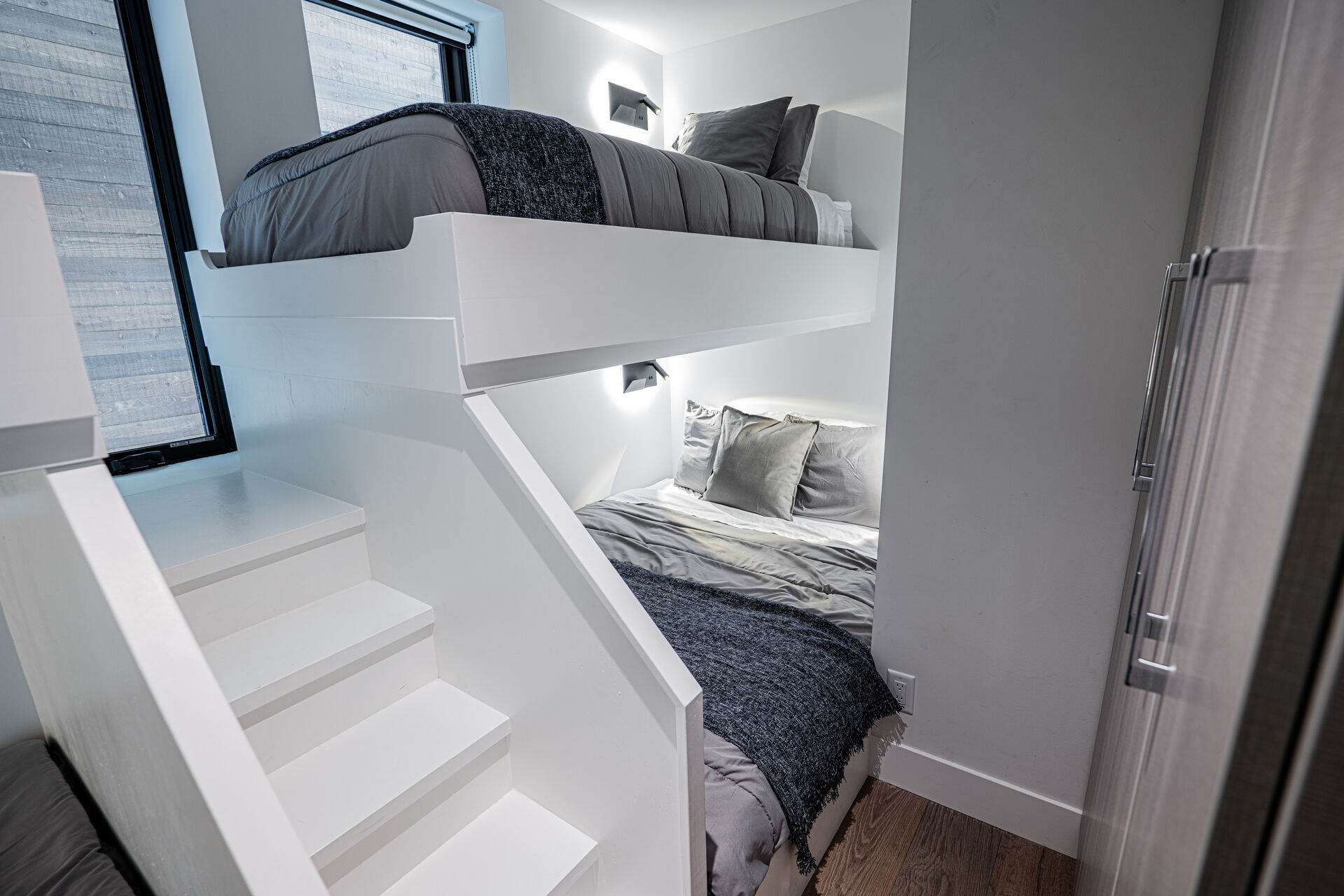 Bedroom 4 (fourth level) —Two Twin over Queen, built-in bunkbeds, and the en-suite bathroom offers a glass and tile shower