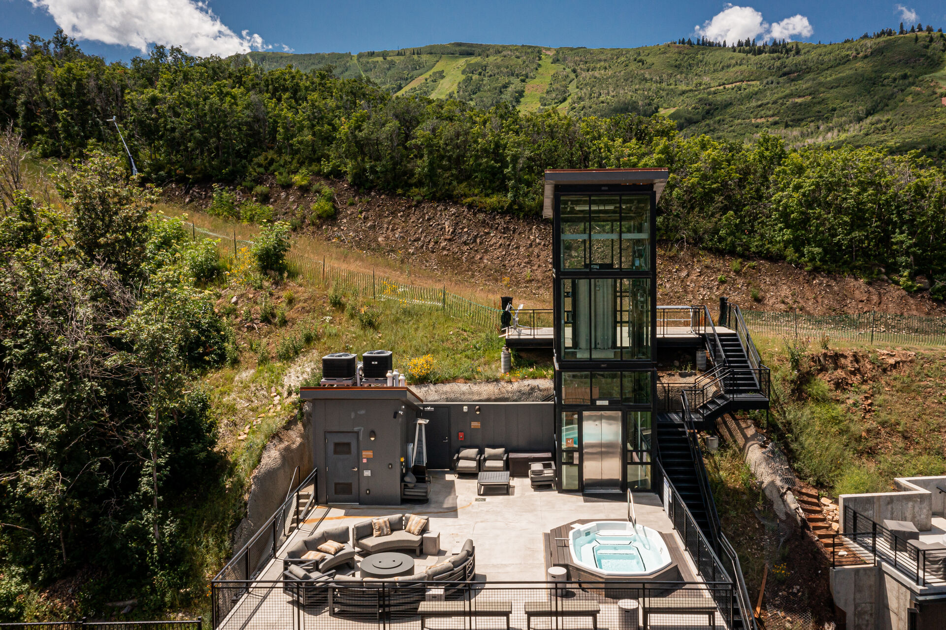 Community rooftop hot tub and seating area