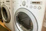Lower Level Laundry Closet with full-sized washer/dryer
