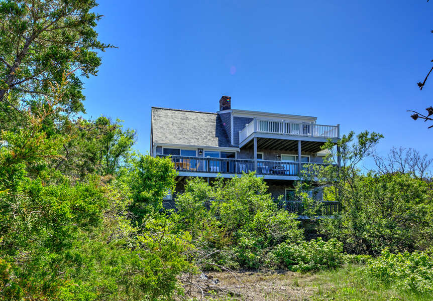 Back of the home- two decks overlooking beautiful views.