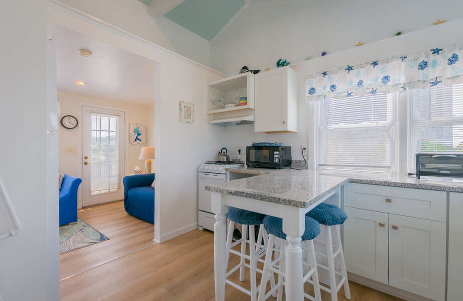 Bright kitchen with seating for the family.