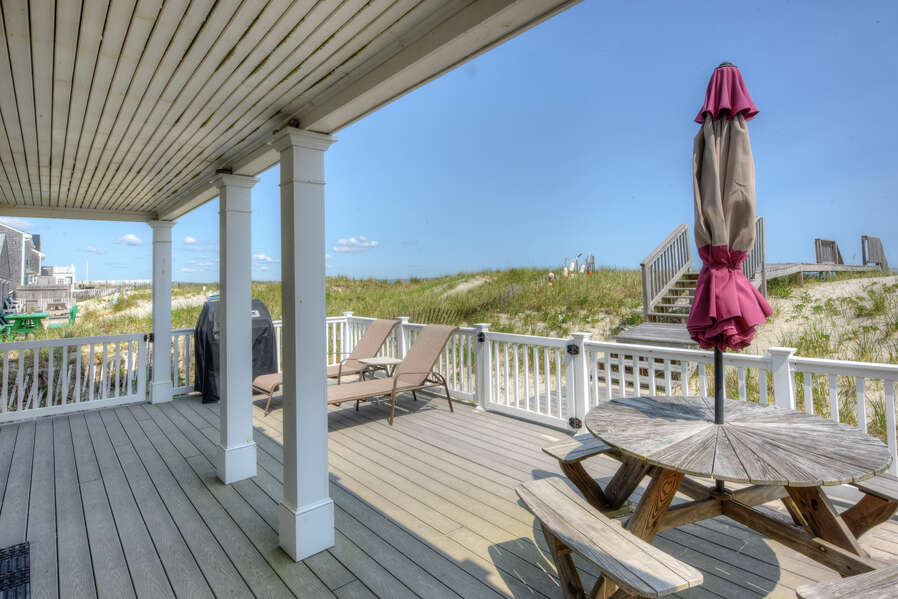 Back deck with beach access.