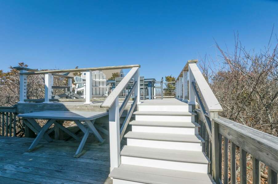 Steps to raised deck with beautiful views of Cape Cod Bay
