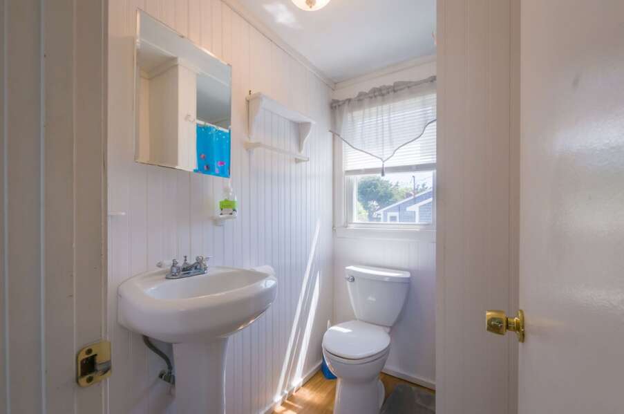 Bathroom with a Shower Stall.
