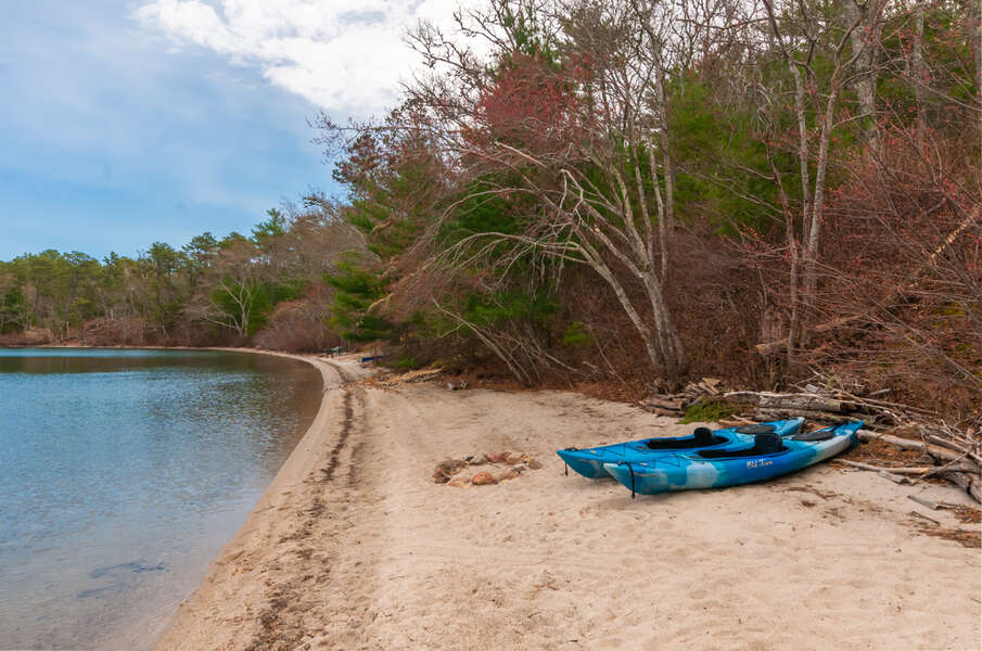 Beach at Triangle Pond, guests can bring their own kayaks and beach toys!