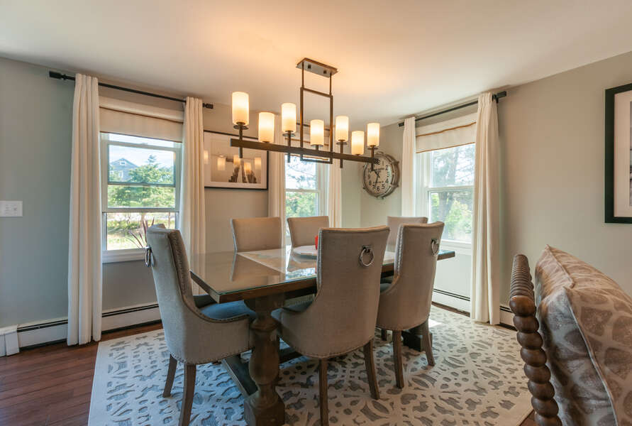 Dining room with seating for six guests.