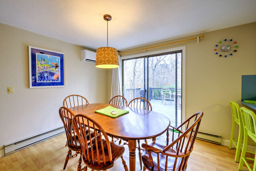 Dining area with seating for six guests.