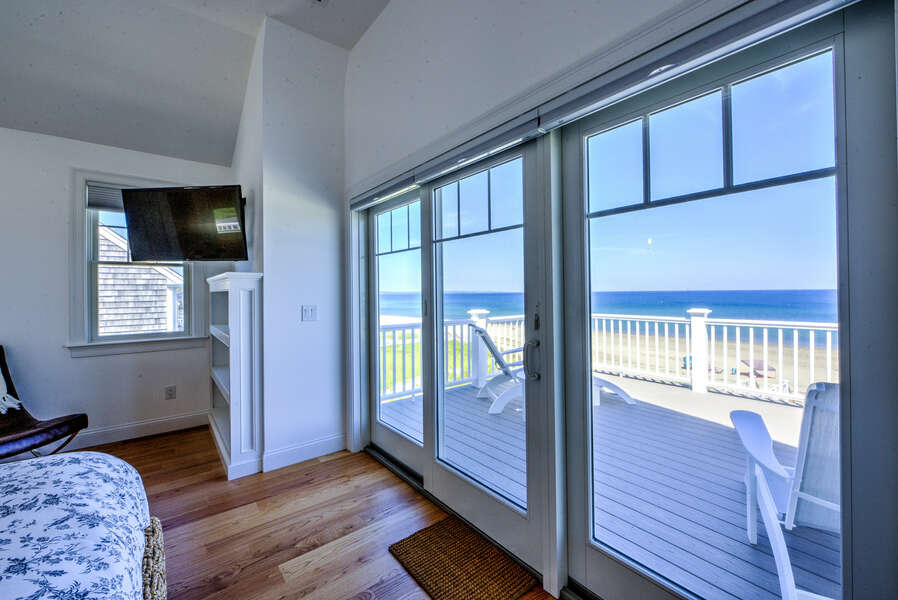 Primary Bedroom - King - Second Floor. With TV and private upstairs deck over looking the ocean.