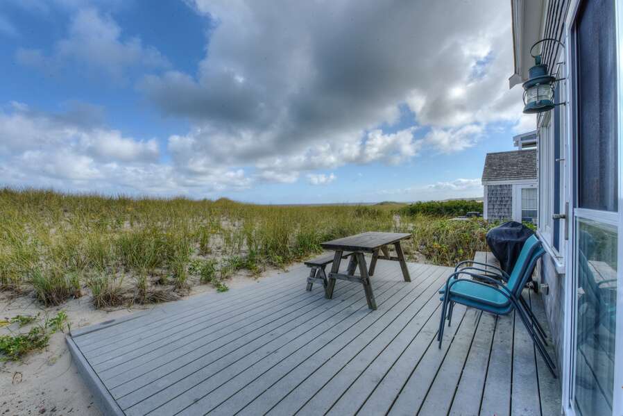 Back Deck with seating and views of East Sandwich Beach.