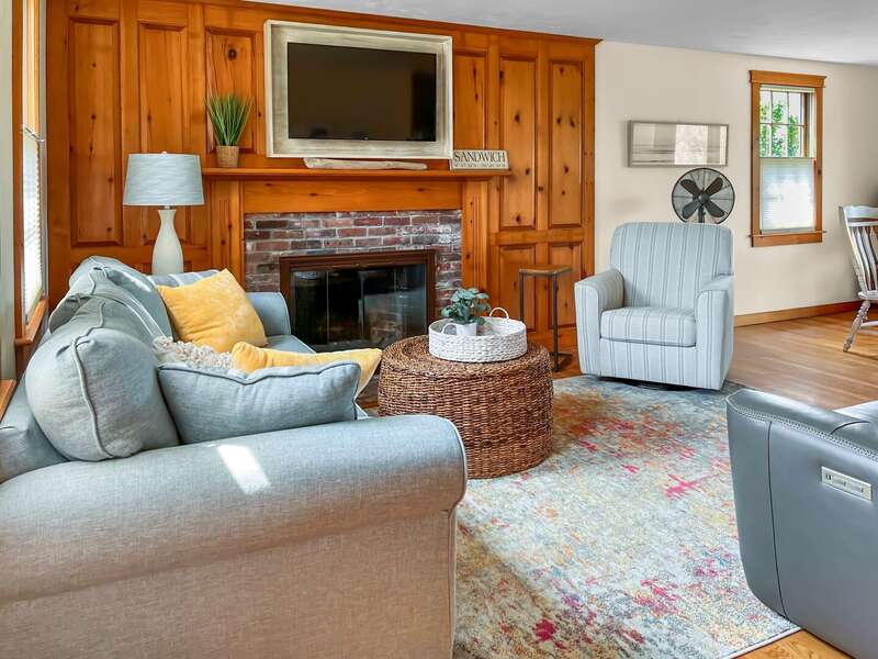 Lovely Cape Cod cottage with working fireplace for guest use.