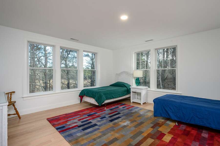 Sleeping space with two Twin-sized beds and marsh views - 85 Cockle Drive South Chatham Cape Cod - Ides of Marsh - New England Vacation Rentals
