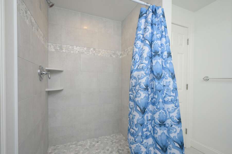 Beautiful and spacious shower in lower level bathroom  - 85 Cockle Drive South Chatham Cape Cod - Ides of Marsh - New England Vacation Rentals