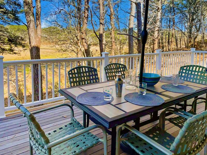 Overlook the conservation land and take in the peaceful views from the deck - 85 Cockle Drive South Chatham Cape Cod - Ides of Marsh - New England Vacation Rentals