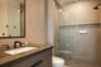 Fourth level master bedroom 3 en suite bathroom with glass shower