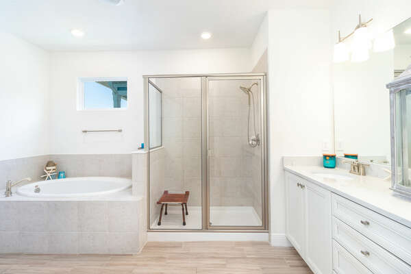 The en-suite includes a garden tub and walk in shower.