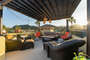 3rd floor tower seating Area / Seating for 7-9/ Pergola/ Pull down shades/ Gorgeous Mountain Views.