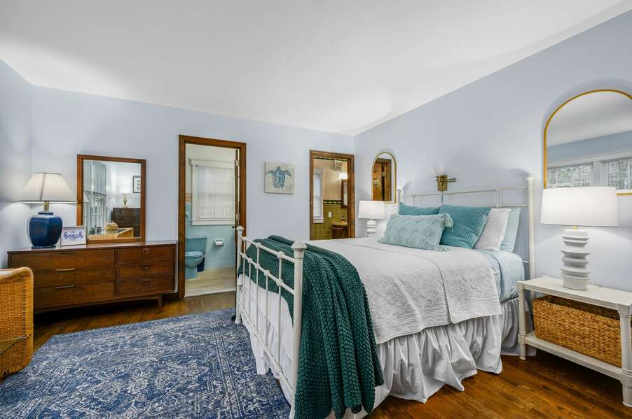 Bedroom #1 is on the main level and has access to its own en suite bathroom as well as Bathroom #2 - 4 Portview Road Chatham Cape Cod - Castlerea - NEVR