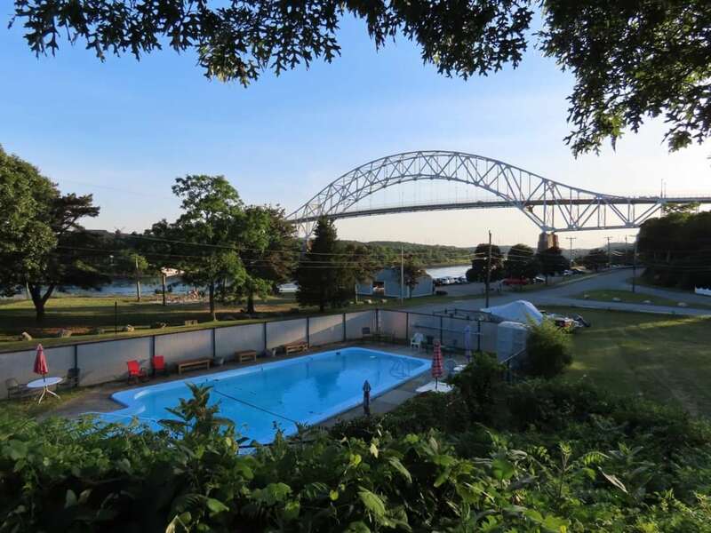 Inground pool with view of Cape Cod Canal
