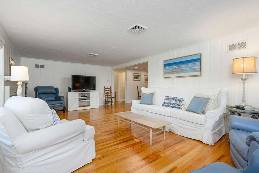 Muted blue tones throughout the whitewashed living space - 3 Shore Road Extension West Harwich Cape Cod - A Shore Thing - New England Vacation Rentals
