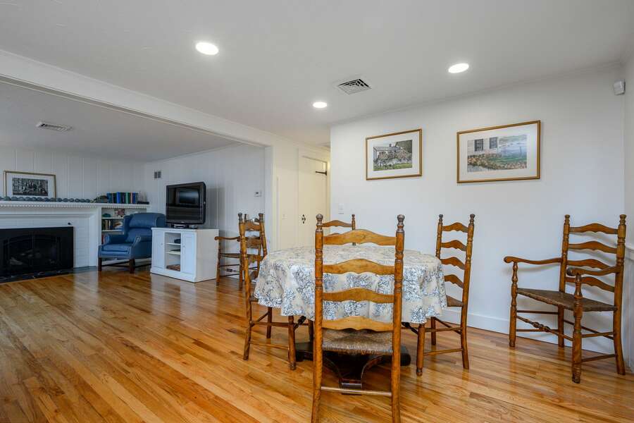 Anchoring the open floorplan, the dining space offers seating for six - 3 Shore Road Extension West Harwich Cape Cod - A Shore Thing - New England Vacation Rentals