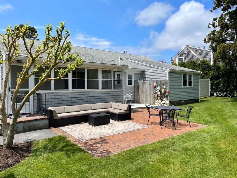 Well-placed foliage provides privacy for outdoor living spaces - 3 Shore Road Extension West Harwich Cape Cod - A Shore Thing - New England Vacation Rentals