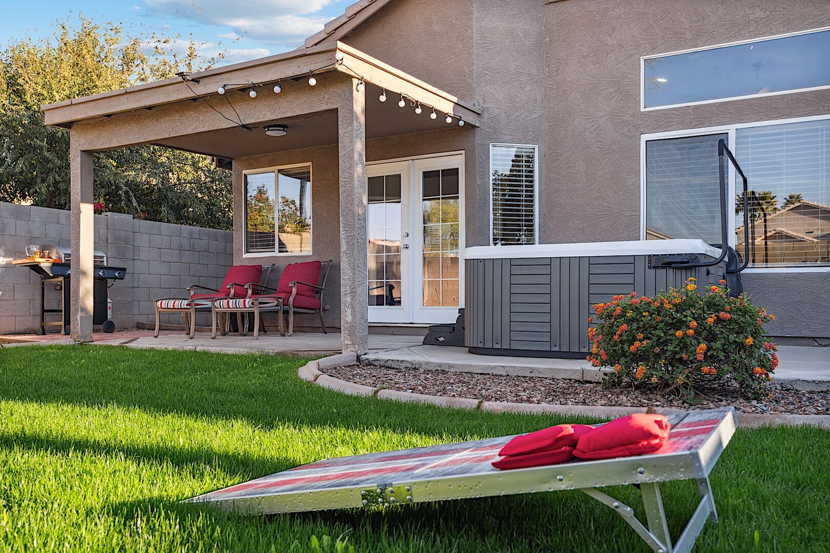 Backyard - Enjoy a relaxing night grilling out and playing a game or Corn Hole, Jenga or Bocce Ball.