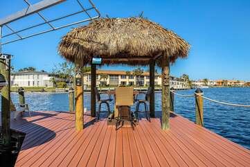 Tiki hut by the water
