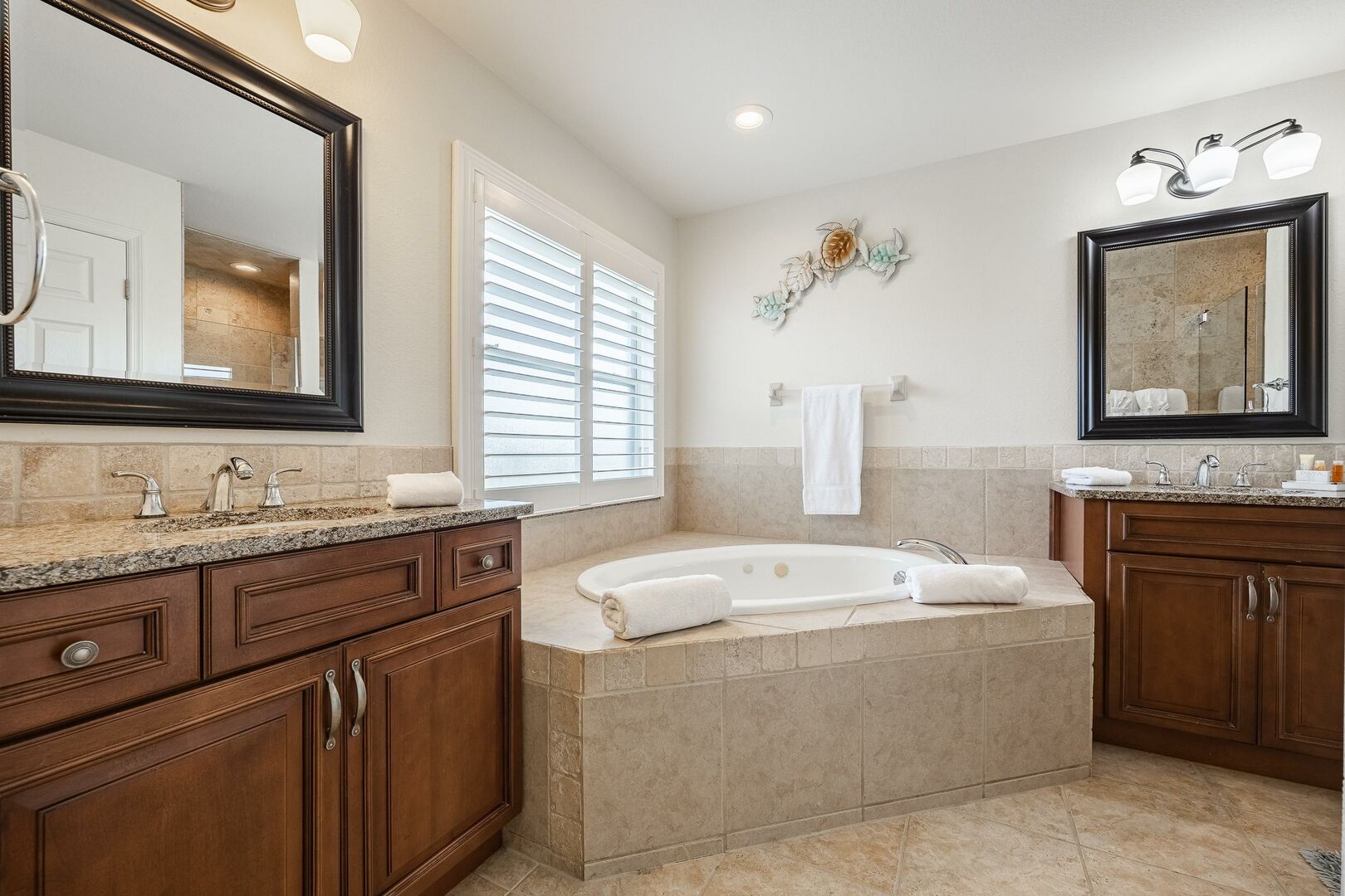 master bathroom with soaking tub and walk in shower