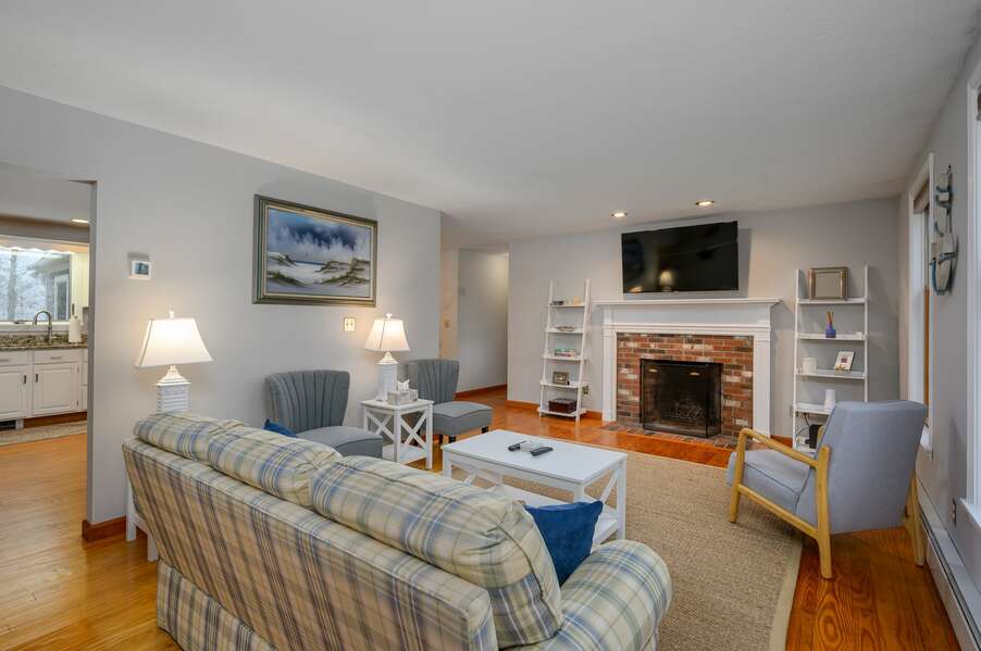 Plenty of seating space for conversations or movie nights on the large flat screen TV - 4 Harvest Hollow Harwich Port Cape Cod - We Shall Sea - NEVR