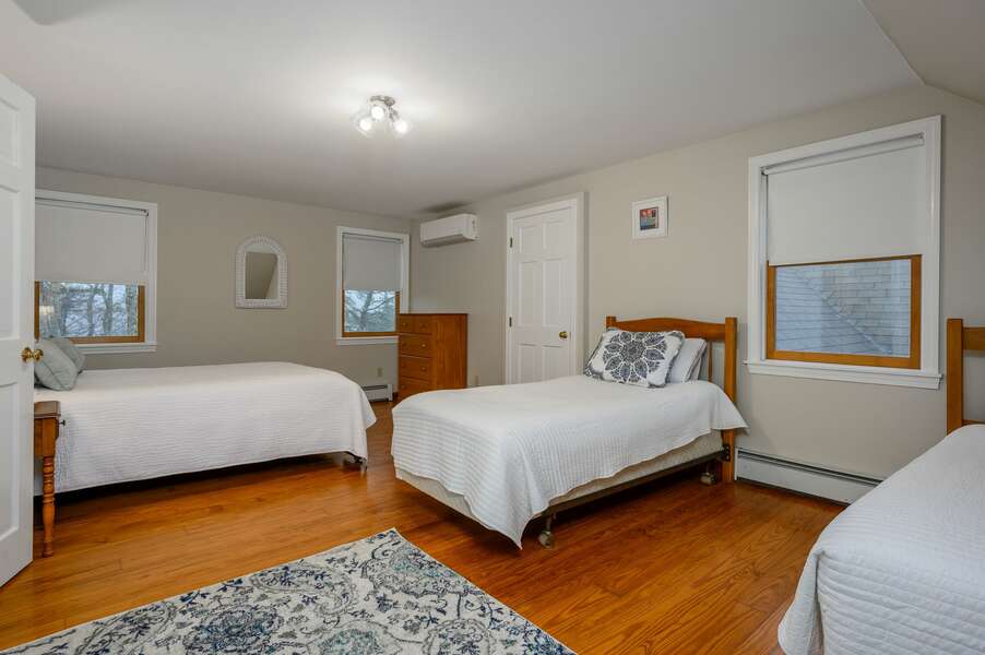 Bedroom #2 on the upper level provides three beds - 4 Harvest Hollow Harwich Port Cape Cod - We Shall Sea - NEVR