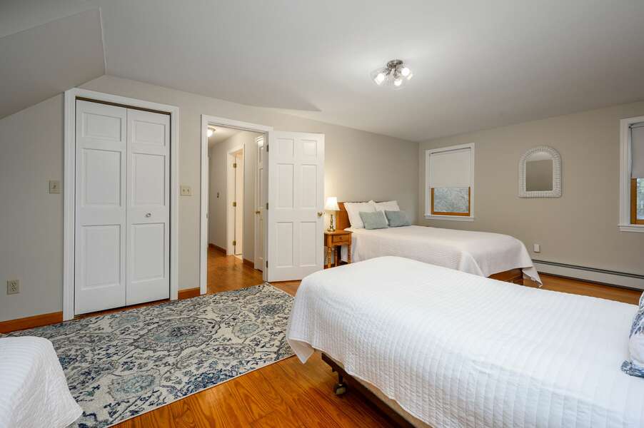 Two Twin beds, a Queen bed and a clean white palate in Bedroom #2 - 4 Harvest Hollow Harwich Port Cape Cod - We Shall Sea - NEVR