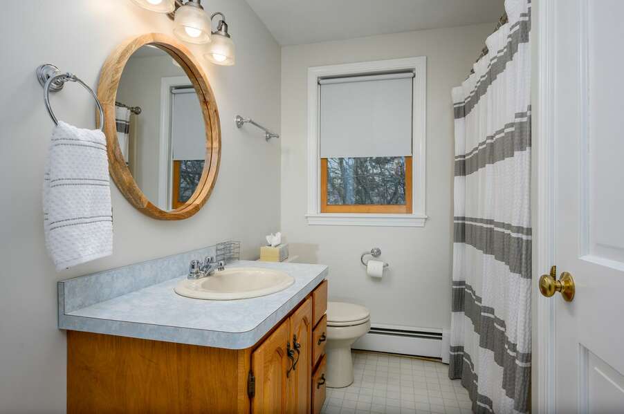 Bathroom #3 is on the upper level between the two bedrooms and features a shower/tub combination - 4 Harvest Hollow Harwich Port Cape Cod - We Shall Sea - NEVR