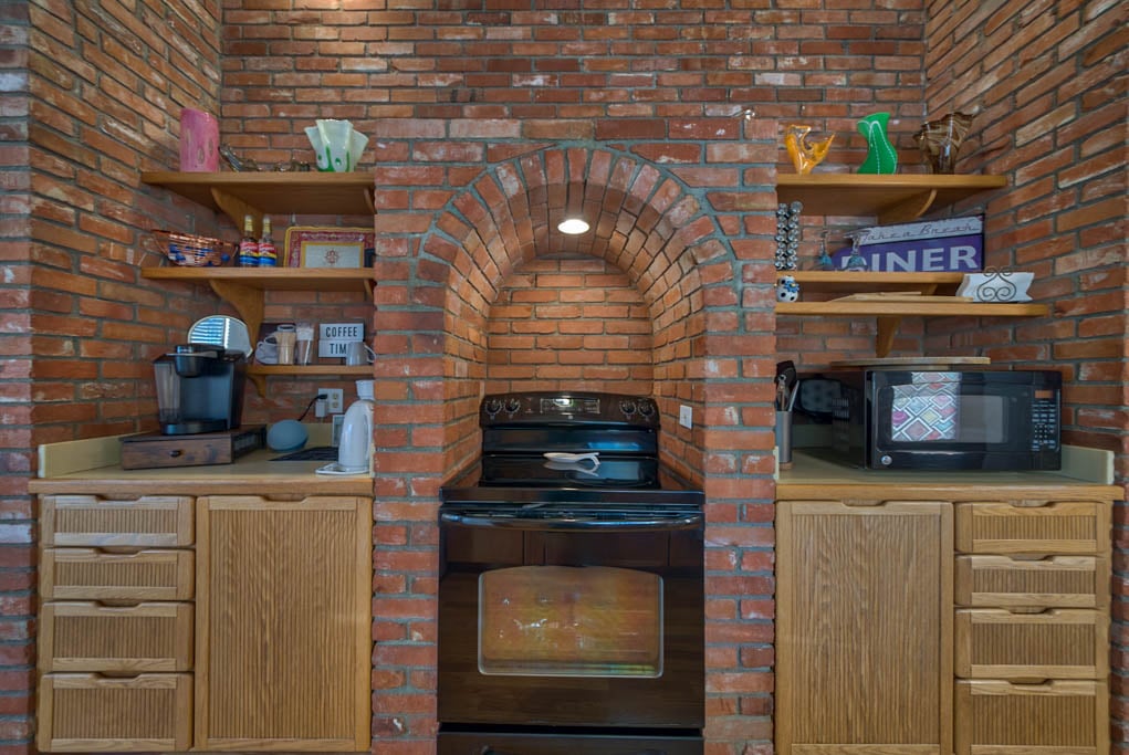 Brickwork in kitchen with unique arch