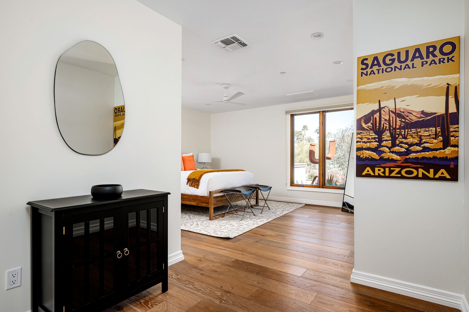 Queen sized bedroom that perfectly encapsulates the southwest image.