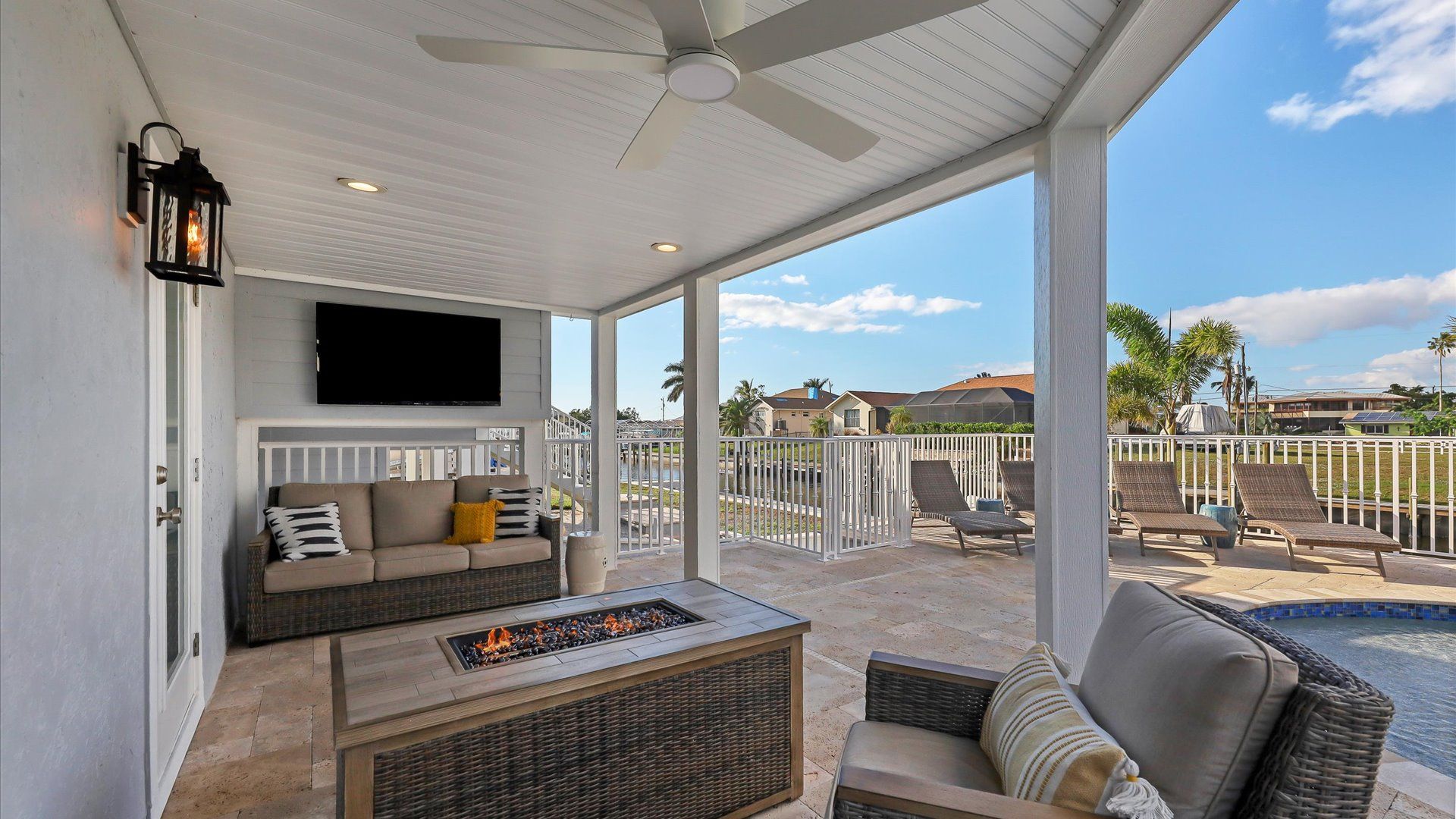 The pool deck is the perfect place to spend your time with a fire table and comfortable seating for gatherings