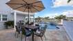 Enjoy outdoor dining on the pool deck