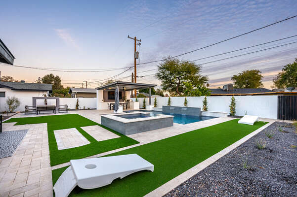 Play corn hole or watch from the jacuzzi!