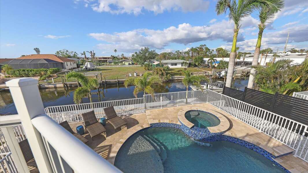 Gorgeous canal views and incredible pool deck overlooking the water