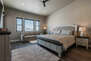 Main Level Grand Master Bedroom with a King Bed