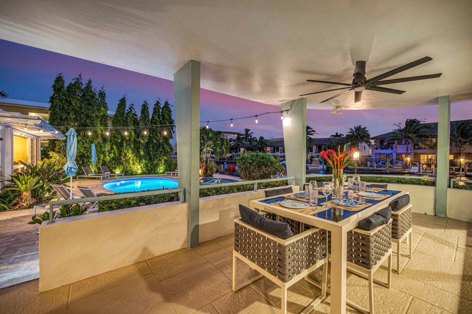 The outdoor dining in Suite One sits six guests and overlooks the pool.