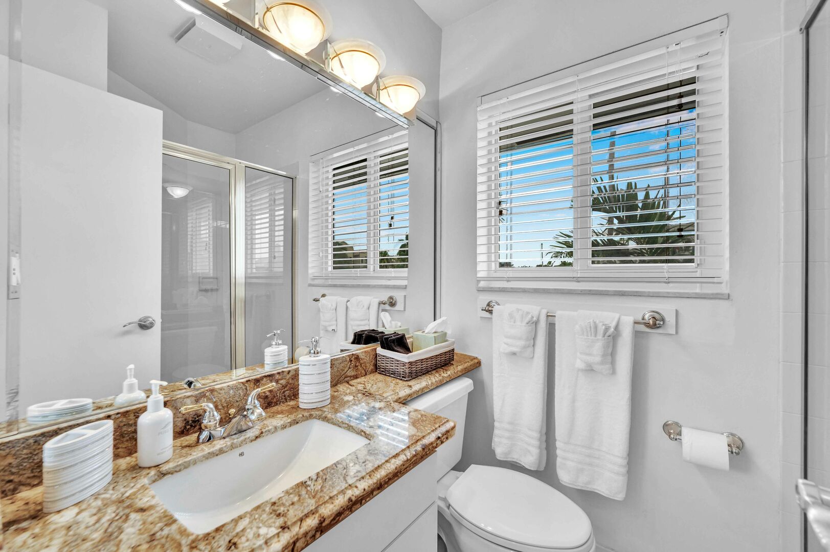 The en-suite bathroom off the upstairs guest room has a shower and includes Latitude Key's signature spa soaps.