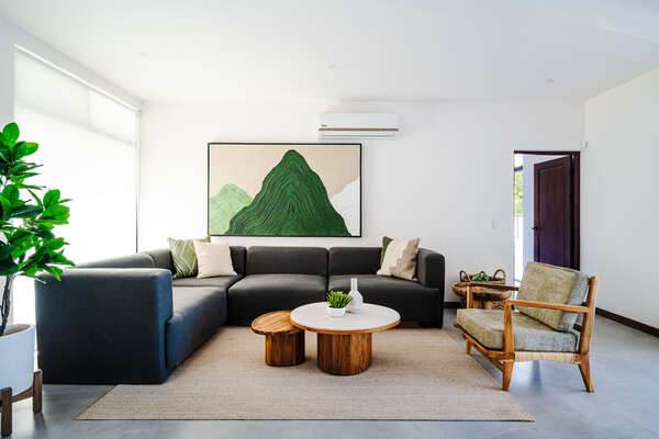 One of the two spacious and comfortable living room, perfect for relaxation and gatherings