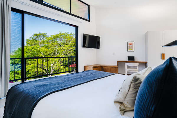 #2. Embrace nature's beauty from our upstairs bedroom, where you can enjoy lovely views and relax on the balcony