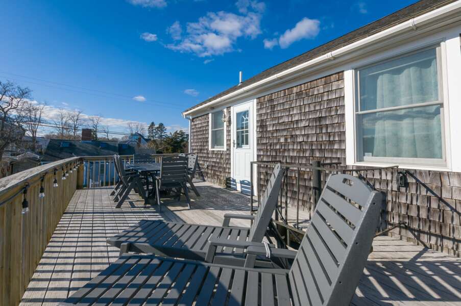 Outdoor lounge area on upper deck- 72 Town Neck Road Town Neck Beach Escape