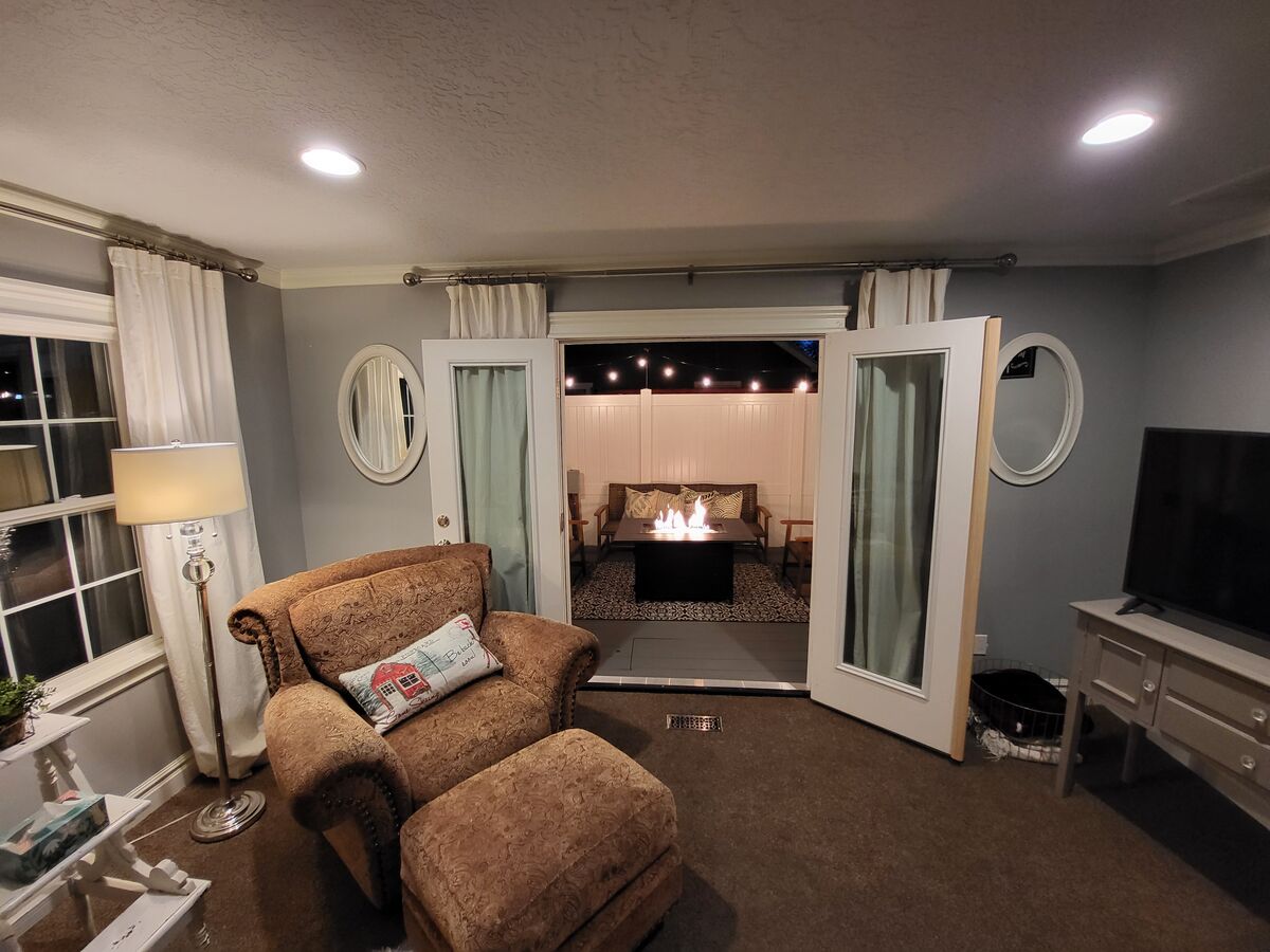 Exit the french doors and step onto the new deck and enjoy a wonderful bistro lit outdoor space complete with, hot tub and fire table.