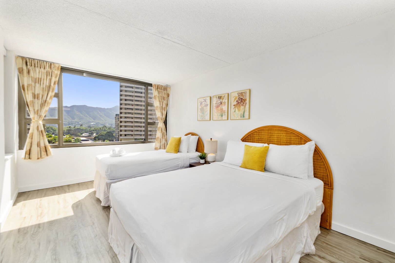 Relax in your bedroom with 1 queen-size and 1 twin-size bed, and a beautiful mountain view.