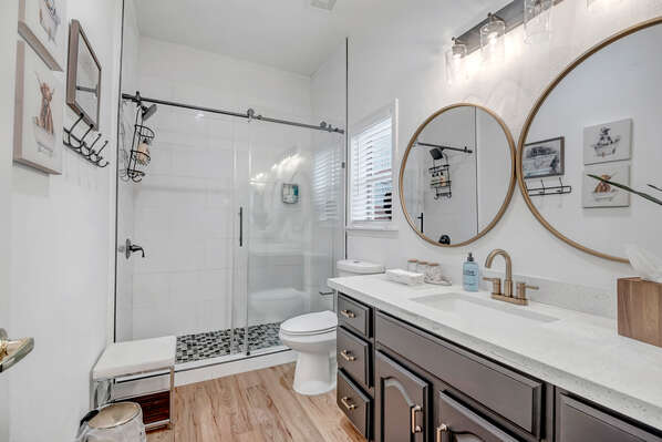 Full Shared Bathroom with Glass Shower
