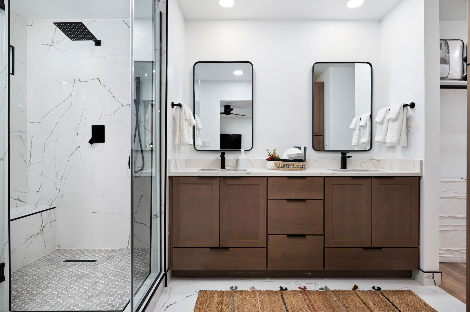 We love this walk in shower with seating. Double vanity sinks.